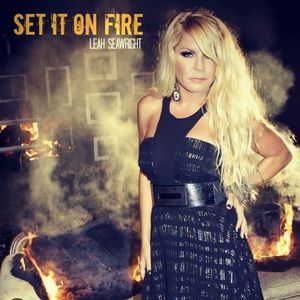 Bebe Black and gold, short front, long back dress